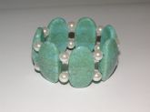 Pulseira Pastilha turquesa com pérolas - Resina